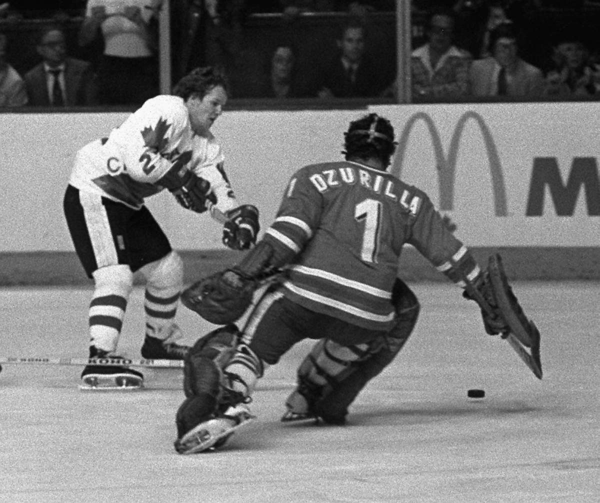 Czechoslovakian goalie Vladimir Dzurilla reaches out, but in vain, as Team Canada's Darryl Sittler puts the puck past him to score and win the Canada Cup for Canada in overtime in Montreal.
