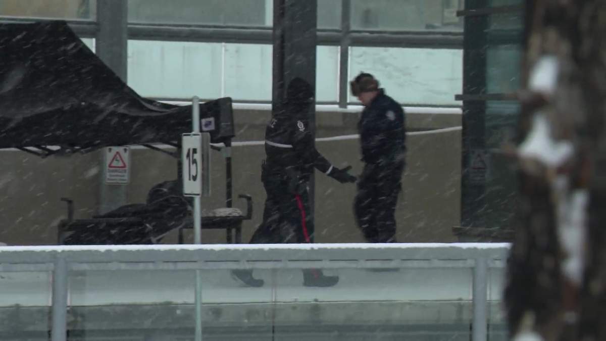 The Edmonton Police Service investigating a death on the MacEwan LRT station platform beside Rogers Place on Thursday, Feb. 6, 2025.