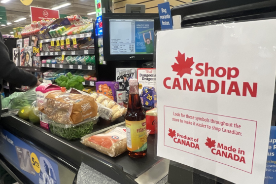 A sign saying Shop Canadian at the till of a Save-On-Foods grocery store in Vancouver, B.C.