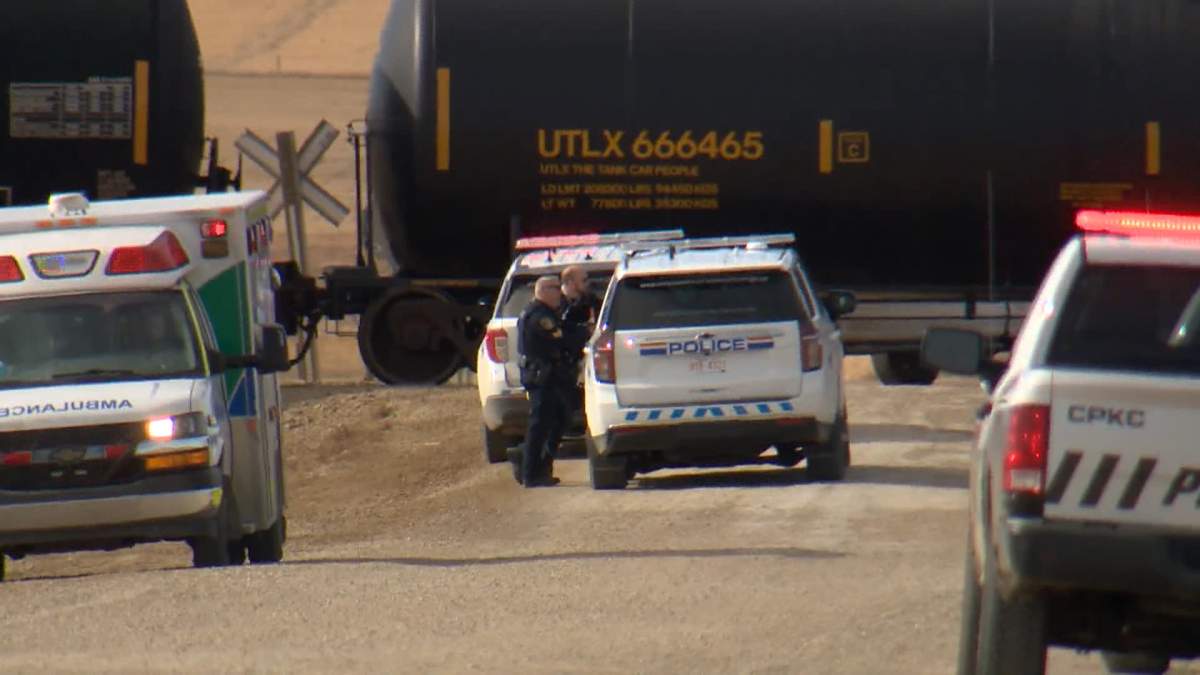 RCMP say there was no danger to the public after a vehicle collided with a train pulling a line of tanker cars near Airdrie on Thursday.