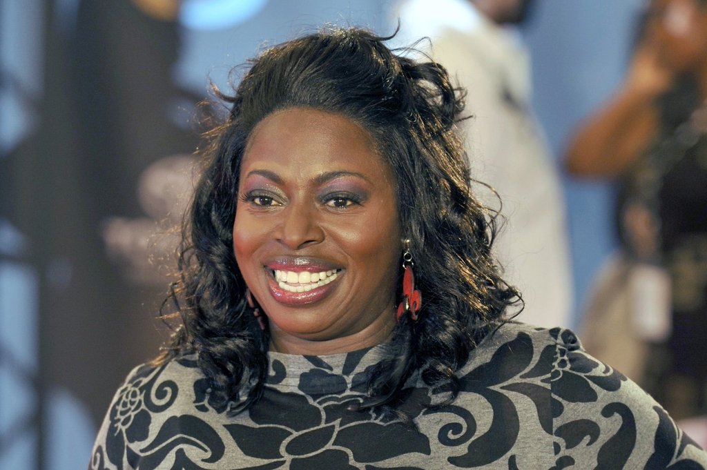 FILE - Angie Stone poses as she walks down the red carpet during the 2009 Soul Train Awards taping at the Georgia World Congress Center, Tuesday, Nov. 3, 2009 in Atlanta.