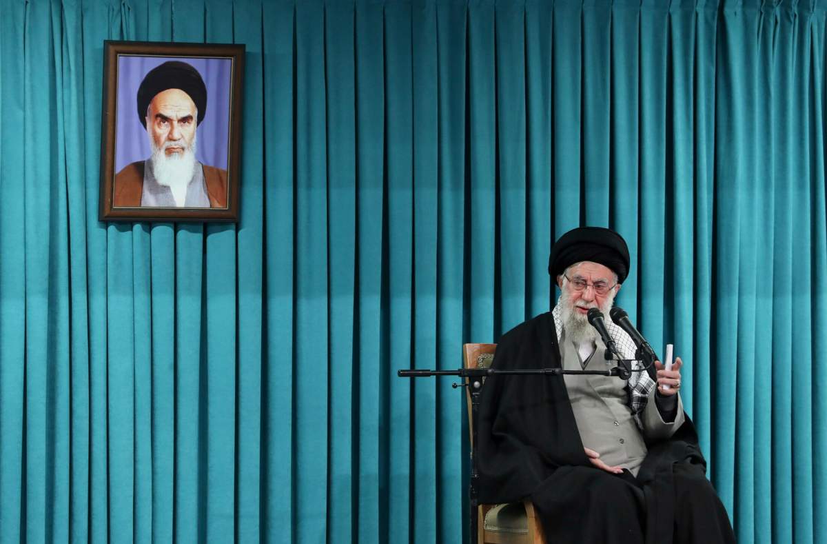 Iranian Supreme Leader Ayatollah Ali Khamenei speaks below portrait of the Ayatollah Khomeini, Tehran, Iran, March 8, 2025.