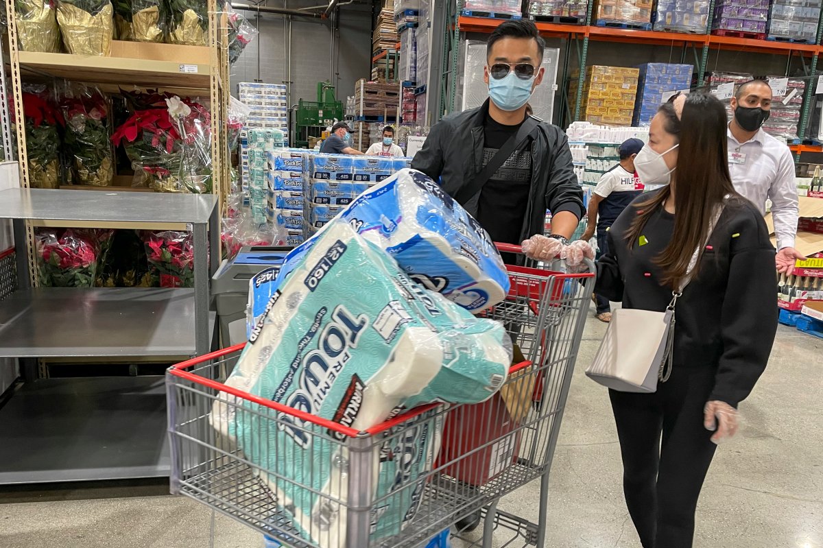 November 21, 2020, Los Angeles, California, USA: People buy toilet papers and paper towels at a Costco Wholesale store as panic buying following the new coronavirus disease (COVID-19) outbreak in Alhambra, Calif., Nov. 21, 2020. Gavin Newsom is imposing an overnight curfew as the most populous state tries to head off a surge in coronavirus cases. On Thursday, Newsom announced a limited stay-at-home order in 41 counties that account for nearly the entire state population of just under 40 million people.