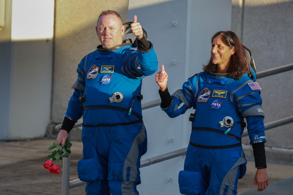 NASA’s Boeing Crew Flight Test Commander Butch Wilmore (L) and Pilot Suni Williams walk out of the Operations and Checkout Building on May 06, 2024 in Cape Canaveral, Florida. The astronauts are heading to Boeing’s Starliner spacecraft, which sits atop a United Launch Alliance Atlas V rocket at Space Launch Complex 41 for NASA’s Boeing crew flight test to the International Space Station. (Photo by Joe Raedle/Getty Ima
