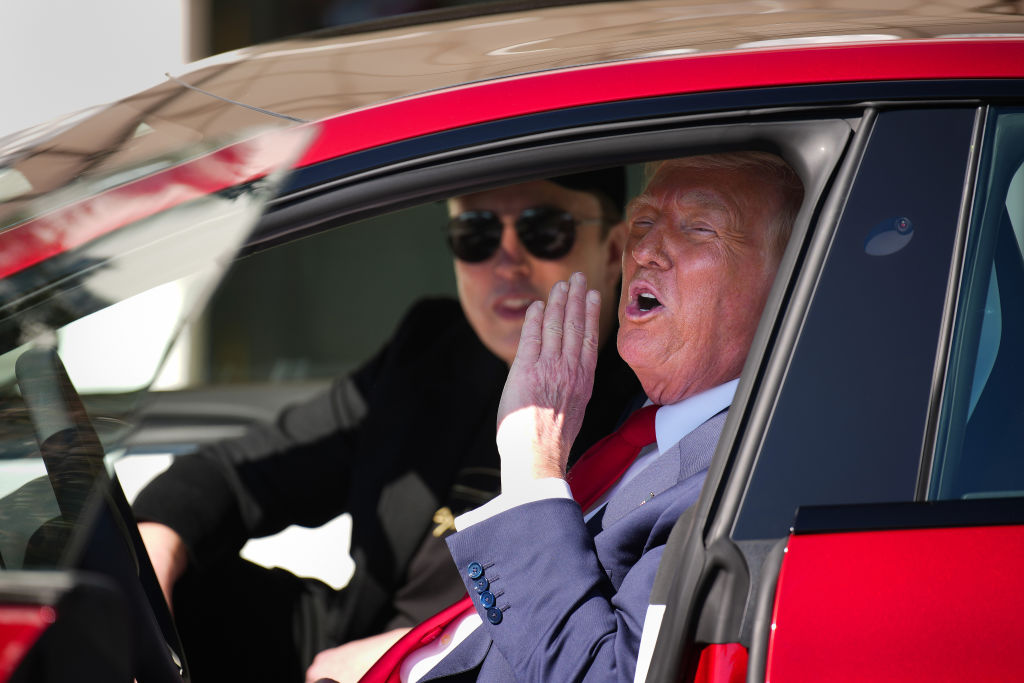 President Donald Trump and White House Senior Advisor, Tesla and SpaceX CEO Elon Musk sit in a Tesla Model S on the South Lawn of the White House on March 11, 2025 in Washington, DC. Trump spoke out against calls for a boycott of Elon Musk’s companies and said he would purchase a Tesla vehicle in what he calls a ‘show of confidence and support’ for Elon Musk. (Photo by Andrew Harnik/Getty Images)