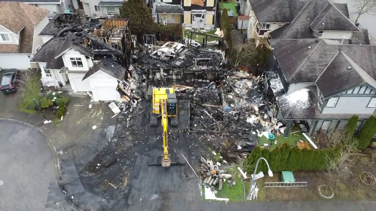 The wreckage of the home in Langley seen from the air.