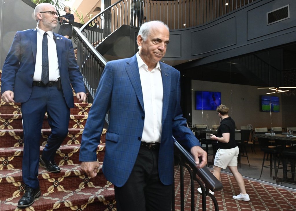 Pierre Fitzgibbon leaves a news conference before a CAQ caucus meeting in Rimouski, Que., Wednesday, Sept.4, 2024. THE CANADIAN PRESS/Jacques Boissinot.