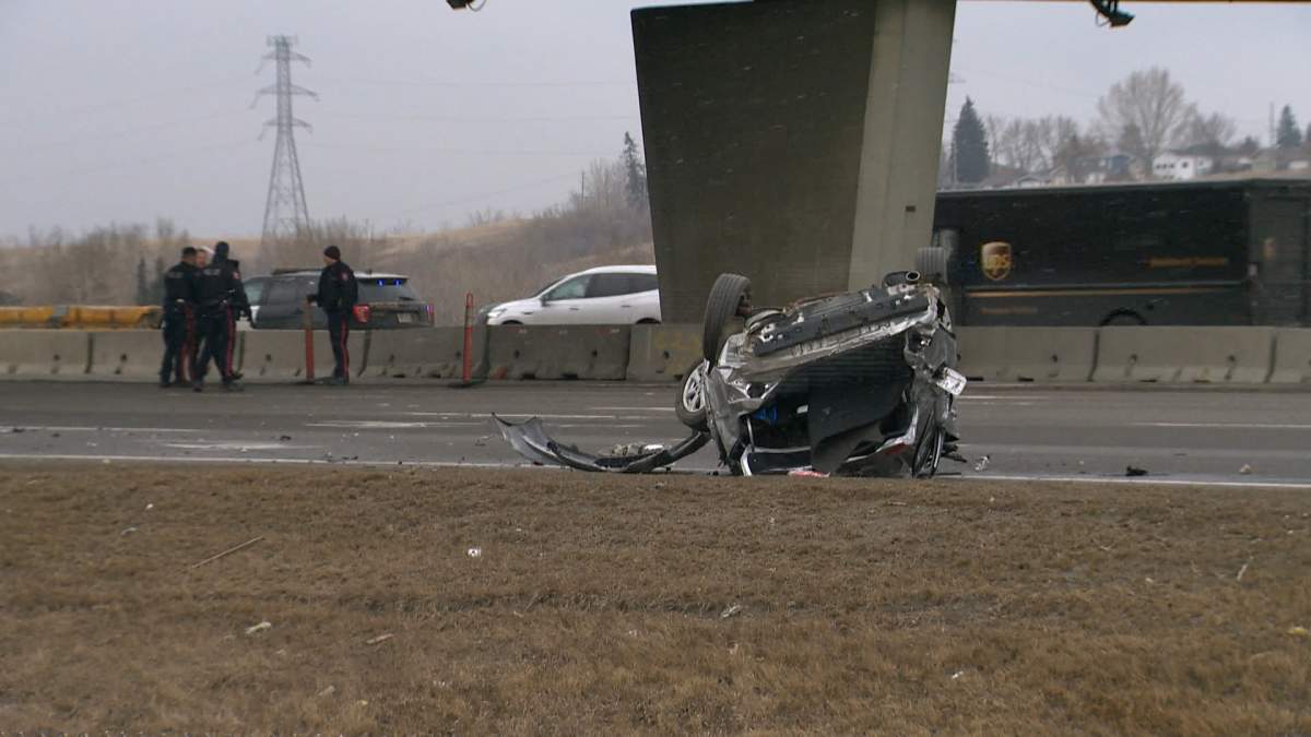 The crash happened under the 8th Avenue flyover and prompted Calgary police to close the northbound lanes on Deerfoot Trail.