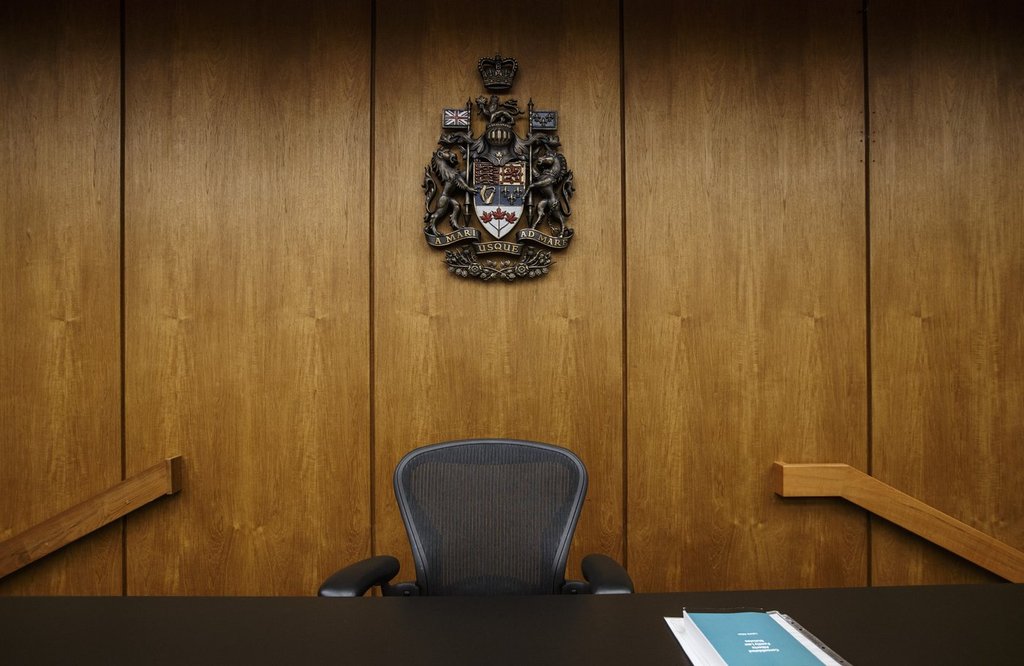 Judges bench at the Edmonton Law Courts building, in Edmonton on June 28, 2019. An Alberta judge has thrown out the case of a man accused of carrying counterfeit money because evidence showed the bills were very clearly Chinese knockoffs.