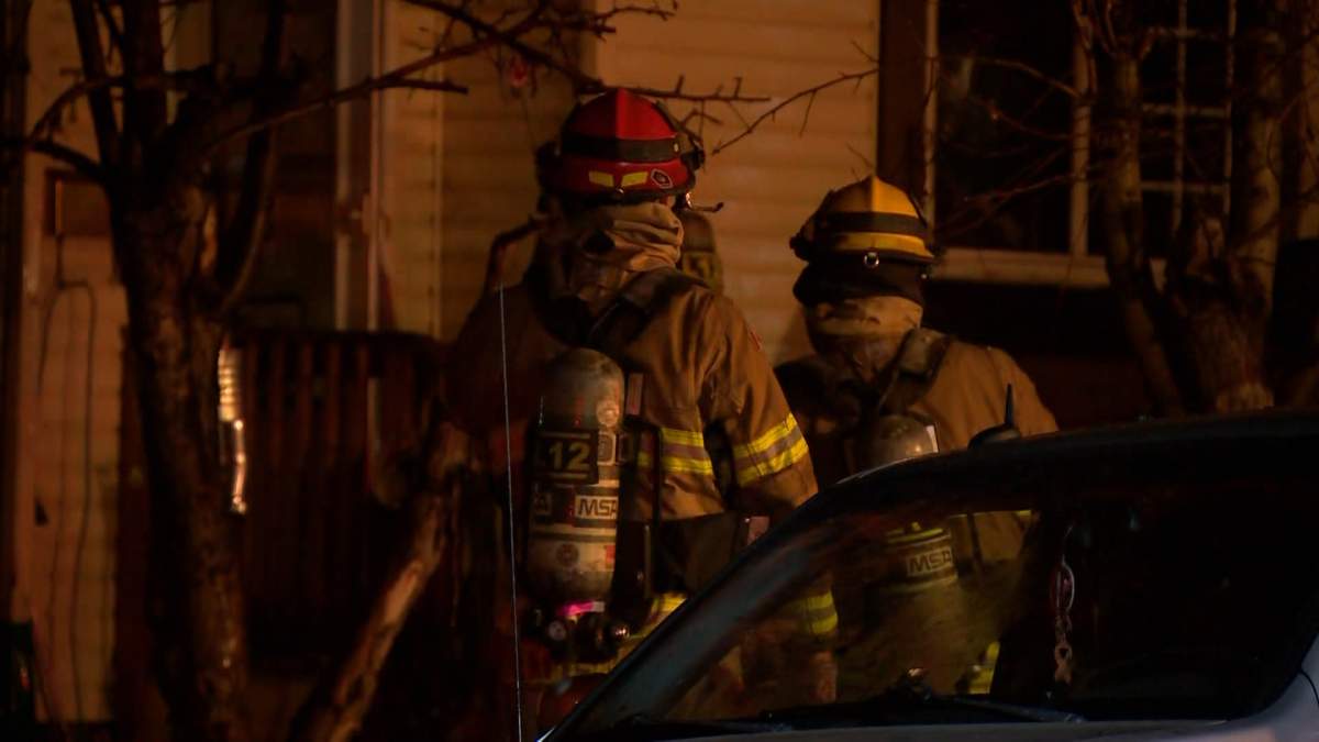 When fire crews arrived at an early morning house fire in Falconridge they were met with visible smoke and flames coming from the building.