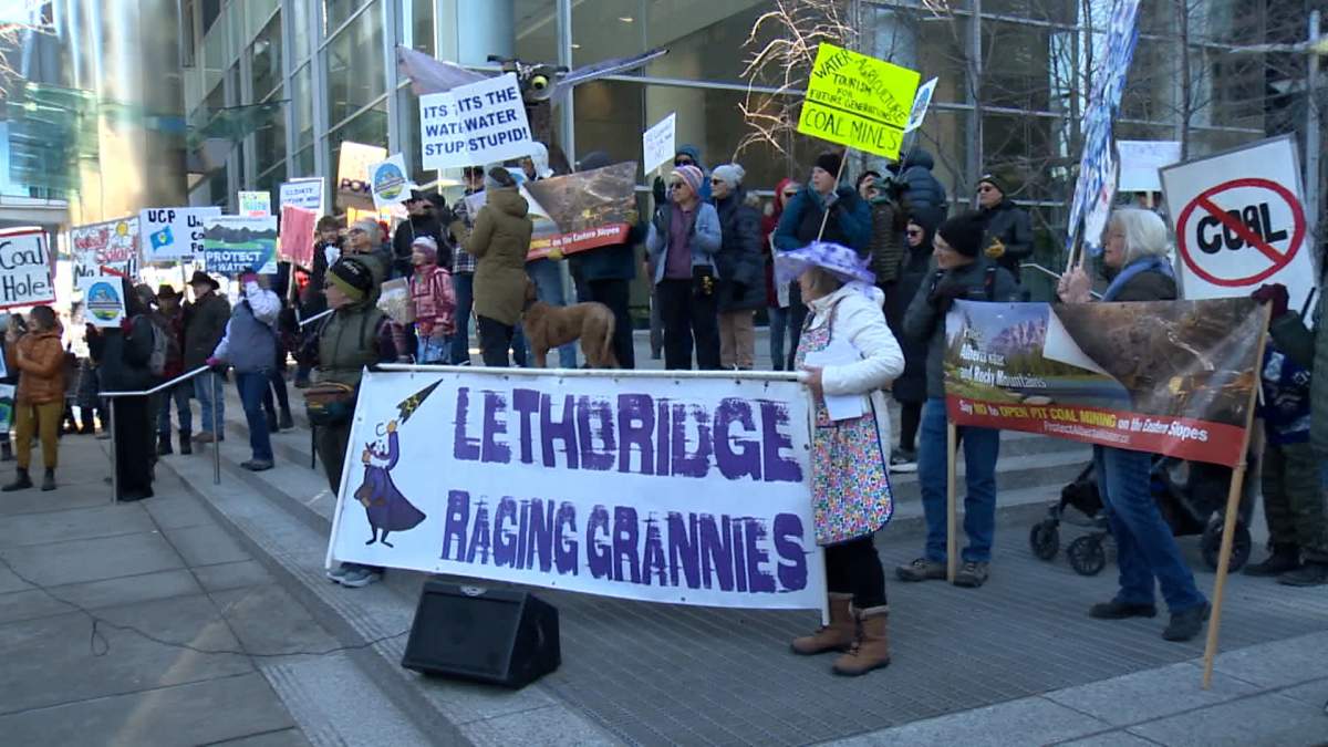 About 100 protestors gathered outside the offices of the Alberta Energy Regulator on Tuesday to show their opposition to coal mining in the eastern slopes of the Rocky Mountains.