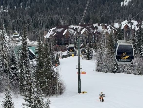 Rescue crews have been called in to help rescue skiiers and snowboarders from the Golden Eagle Express gondola after one of the lift's cars fell to the ground Monday morning.