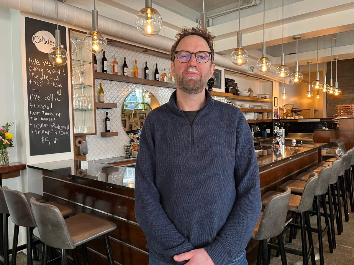 Christian Rankin, co-owner of Obladee Wine Bar, is calling on the municipality to step in and fix the building’s crumbling exterior.