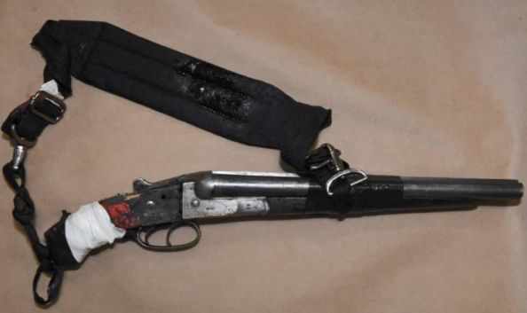 A shotgun used by a suspect on Dec. 31, 2021.