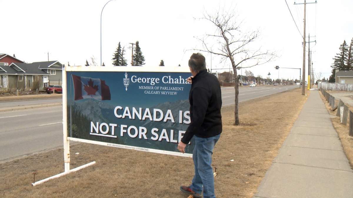 These signs, featuring Calgary-Skyview MLA George Chahal are not illegal because they don't mention the election or ask for support from potential voters.