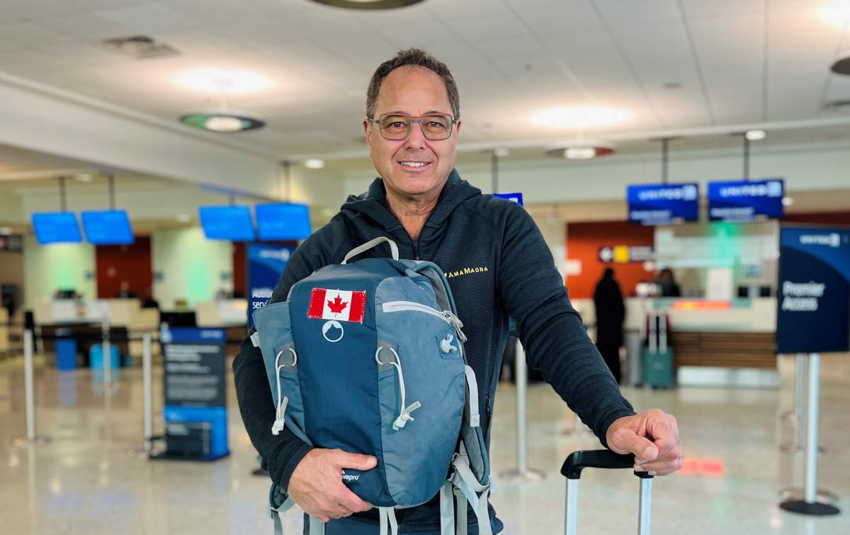 Bell sewed a Canadian patch on his backpack for his trip to Columbia.