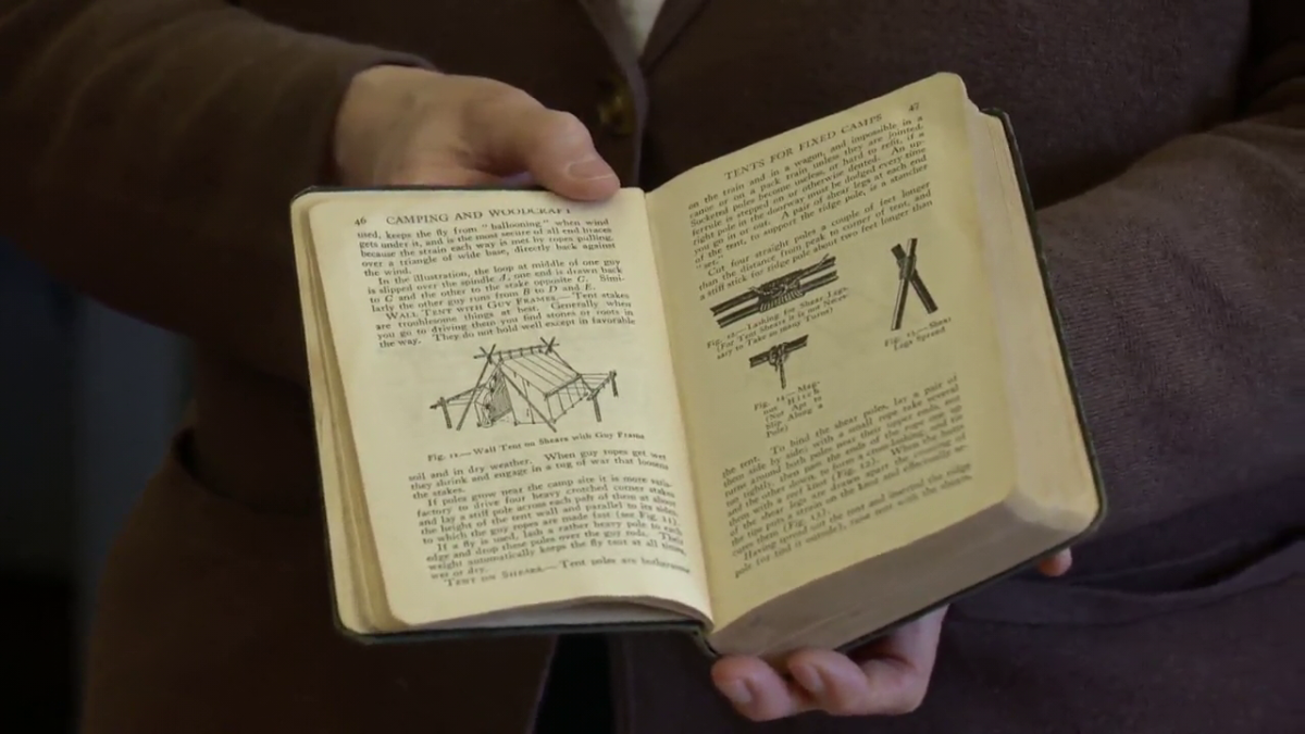 The 1934 copy of ‘Camping and Woodcraft: A Handbook for Vacation Campers and for Travelers in the Wilderness’ that Robert Murray returned to the UBC library 64 years late.
