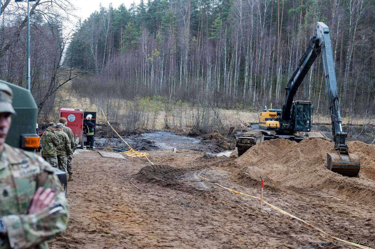 Recovery efforts continue for four missing U.S. soldiers near the spot where their Hercules armored vehicle was found submerged at a training range in Pabrade, north of the capital Vilnius, Lithuania on Thursday, March 27, 2025. 