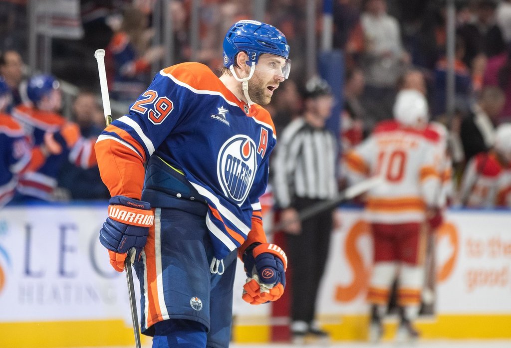 Edmonton Oilers' Leon Draisaitl (29) celebrates his 50th goal of the season against the Calgary Flames during third period NHL action in Edmonton on Saturday, March 29, 2025.