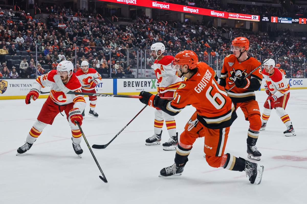 Anaheim Ducks winger Cutter Gauthier, center, attempts to score during the third period of an NHL hockey game, Wednesday, April 9, 2025, in Anaheim, Calif.