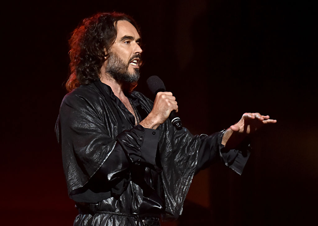 Russell Brand speaks onstage during MusiCares Person of the Year honoring Aerosmith at West Hall at Los Angeles Convention Center on January 24, 2020 in Los Angeles, California.