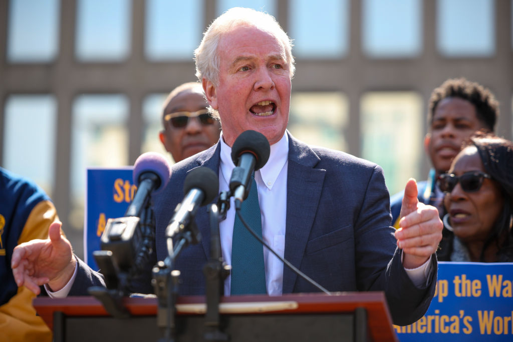 U.S. Sen. Chris Van Hollen (D-MD) speaks to the media alongside union leaders and workers outside the Office of Personnel Management (OPM) headquarters on March 04, 2025 in Washington, DC. Workers gathered to protest recent cuts made to the department by Elon Musk's Department of Government Efficiency (DOGE).