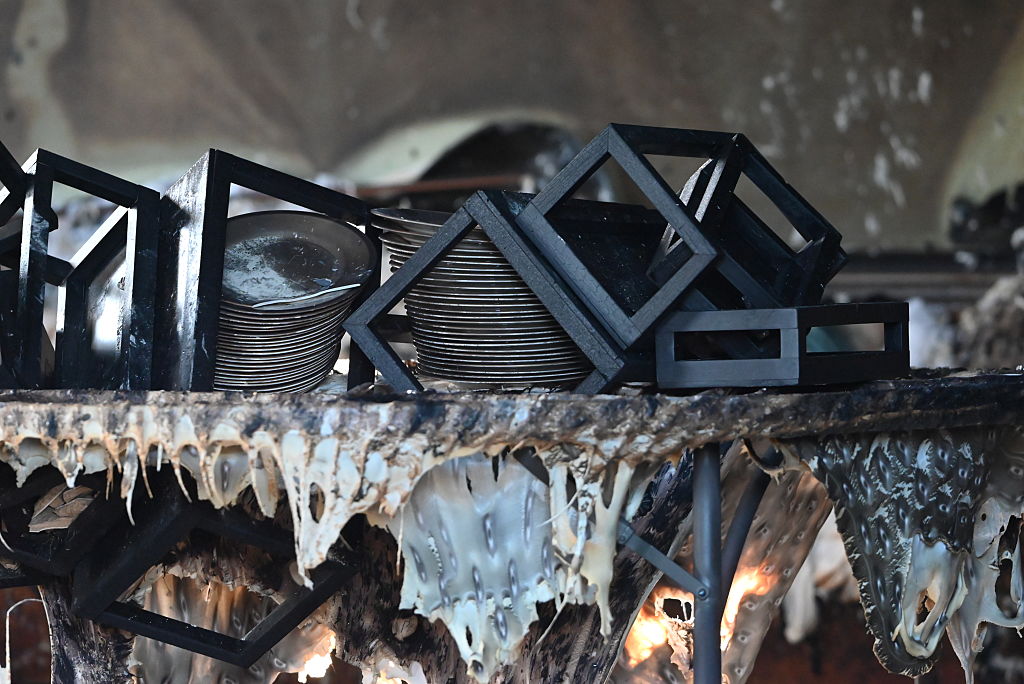 A view of damaged plates after an arsonist sets fire to the Pennsylvania Governor Josh Shapiro's residence in a targeted attack in Harrisburg, Pennsylvania, on April 13, 2025.