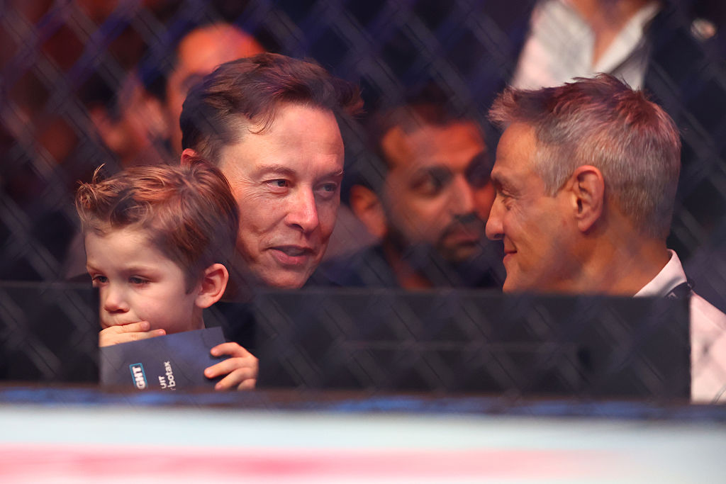 Elon Musk (L) attends UFC 314 at Kaseya Center on April 12, 2025 in Miami, Florida. with his son, X Æ A-Xii.