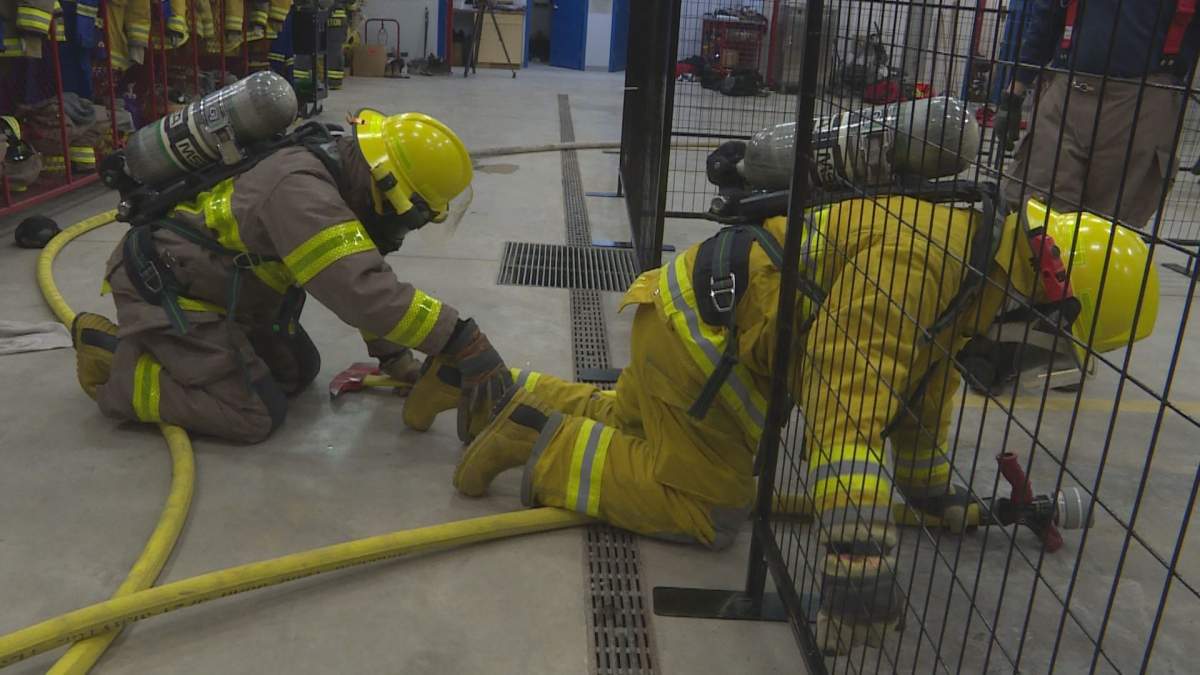 Firefighters take part in an exercise.