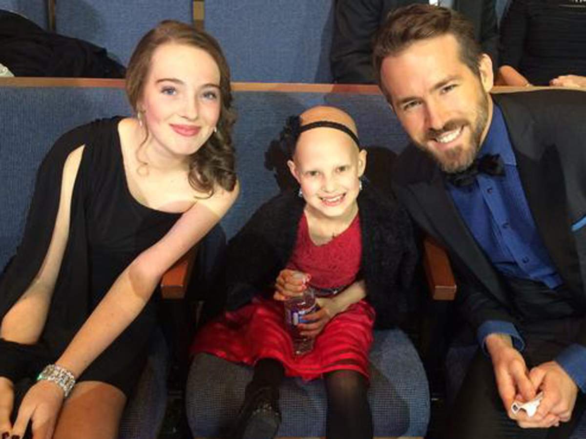 Ryan Reynolds alongside Grace Bowen.