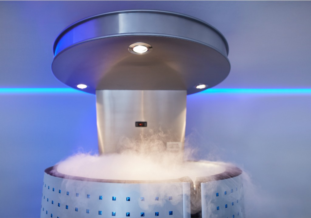 A file photo of a cryotherapy capsule with cold nitrogen vapors in cosmetology clinic. Cryo sauna for whole body cryotherapy treatment.