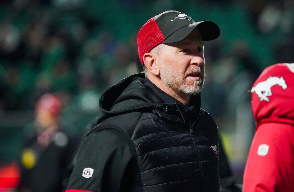 Calgary Stampeders head coach Dave Dickenson walks off the field at halftime of CFL football action against the Saskatchewan Roughriders in Regina, on Saturday, October 26, 2024.