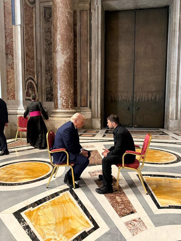 In this photo provided by the Ukrainian Presidential Press Office, Ukraine's President Volodymyr Zelenskyy, right, and President Donald Trump, talk as they attend the funeral of Pope Francis in Vatican, Saturday, April 26, 2025.
