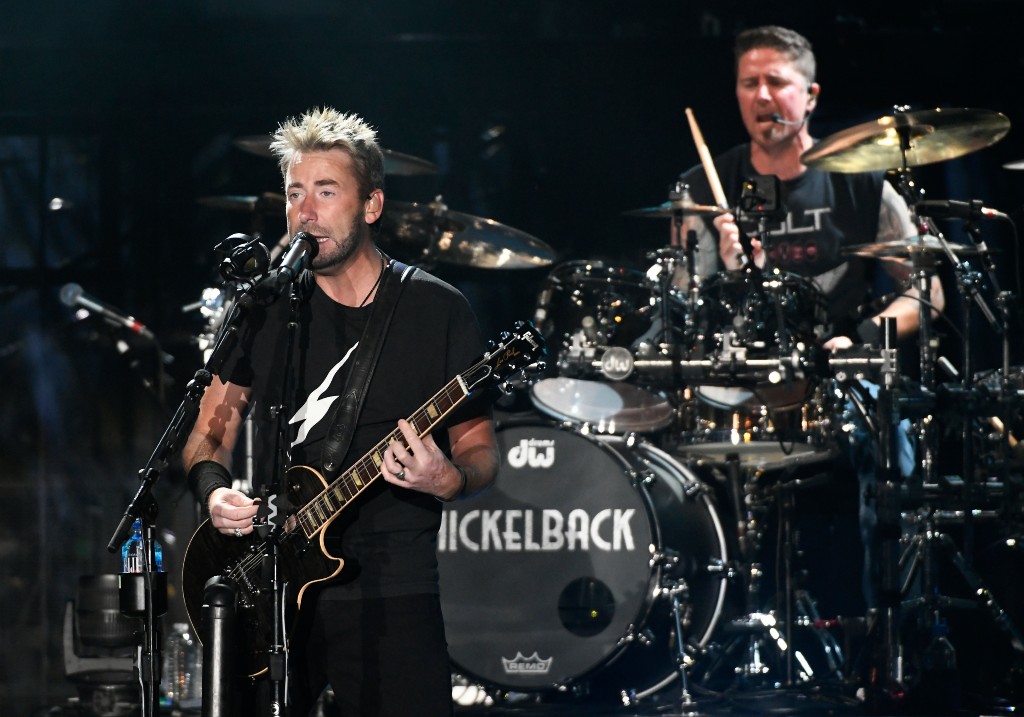 Chad Kroeger (L) and Daniel Adair of Nickelback perform during the band's Get Rollin' tour at Toyota Amphitheatre on July 08, 2023 in Wheatland, California.