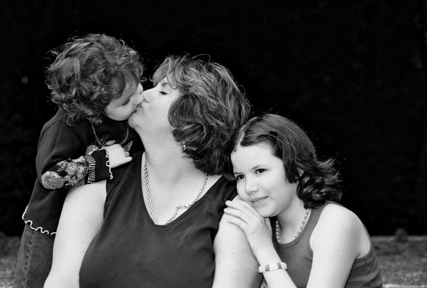 Sarah Sherman and her two daughters are shown at around the time of her ex-husband’s attack in 2004.