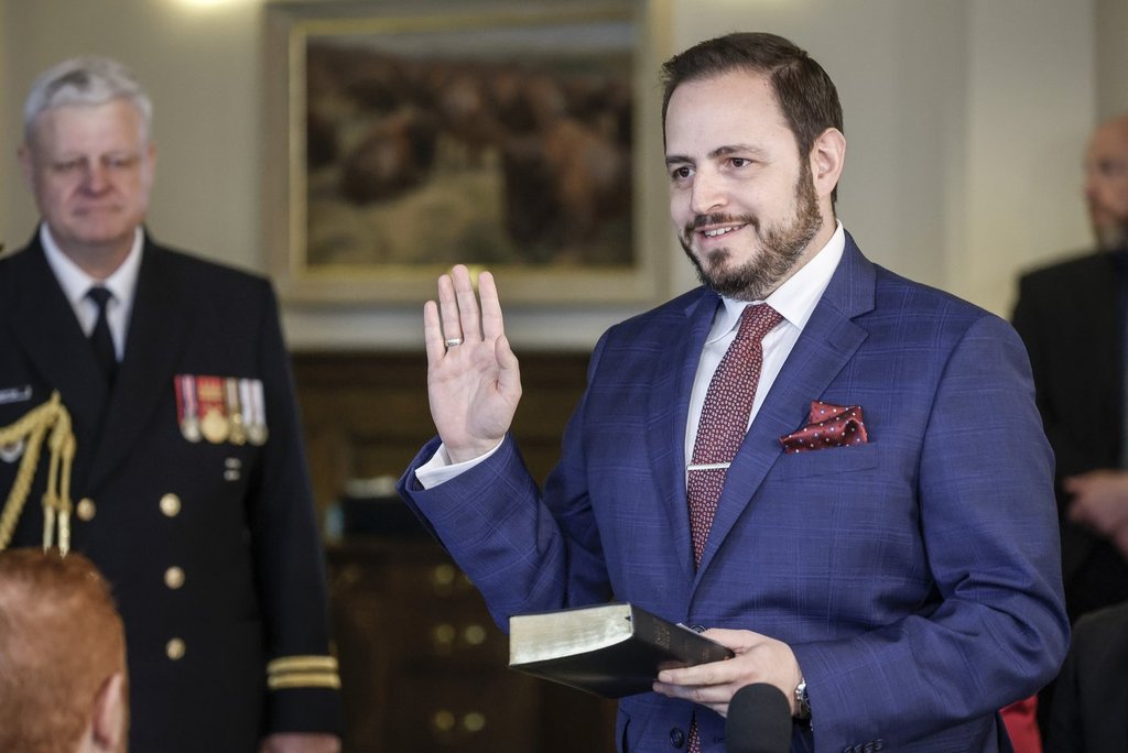 Minister of Education and Childcare, Demetrios Nicolaides, swears the oath of office in Calgary, Alta., Friday, May 16, 2025. 