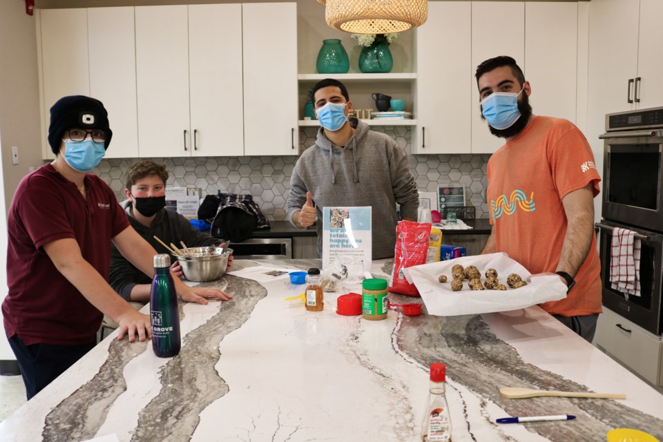 Facilitators and youth participating in the healthy eating program, Game On!, at Big Brothers Big Sisters of Centre Wellington.