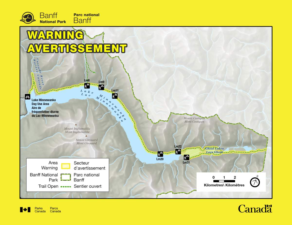 Visitors to Banff National Park who want to explore Lake Minnewanka Trail are being asked to be careful as park officials have issued a bear warning for the area.