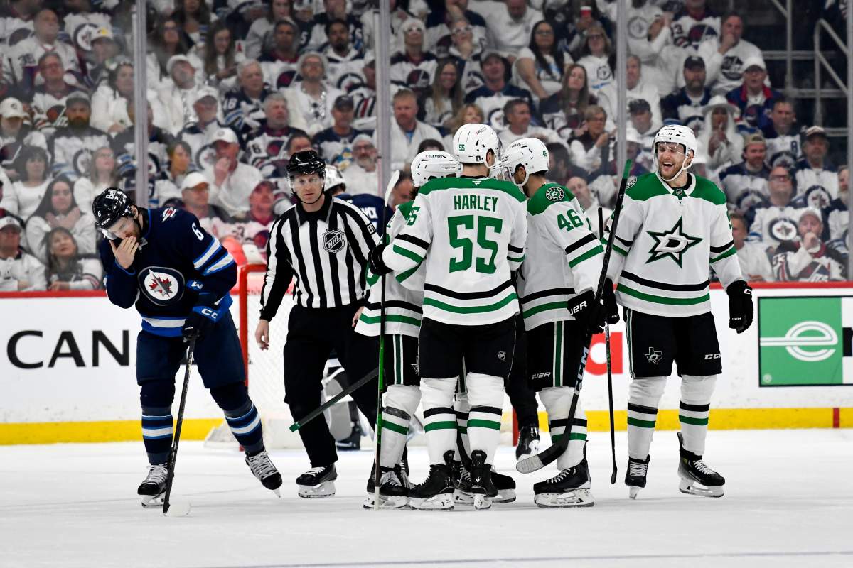 Dallas Stars' Mikko Rantanen (right) celebrates his goal against the Winnipeg Jets with teammates during second period NHL playoff hockey action in Winnipeg, Wednesday, May 7, 2025. THE CANADIAN PRESS/Fred Greenslade.
