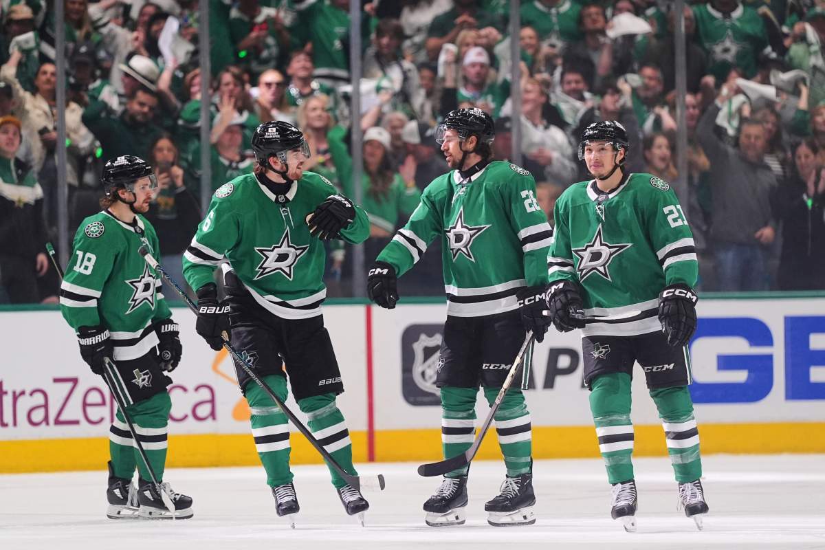 Dallas Stars' Sam Steel (18), Lian Bichsel (6), Alexander Petrovic (28) and Jason Robertson (21) celebrate after Petrovic scored in the third period of Game 3 of a second-round NHL hockey playoff series against the Winnipeg Jets in Dallas, Sunday, May 11, 2025. (AP Photo/Julio Cortez).