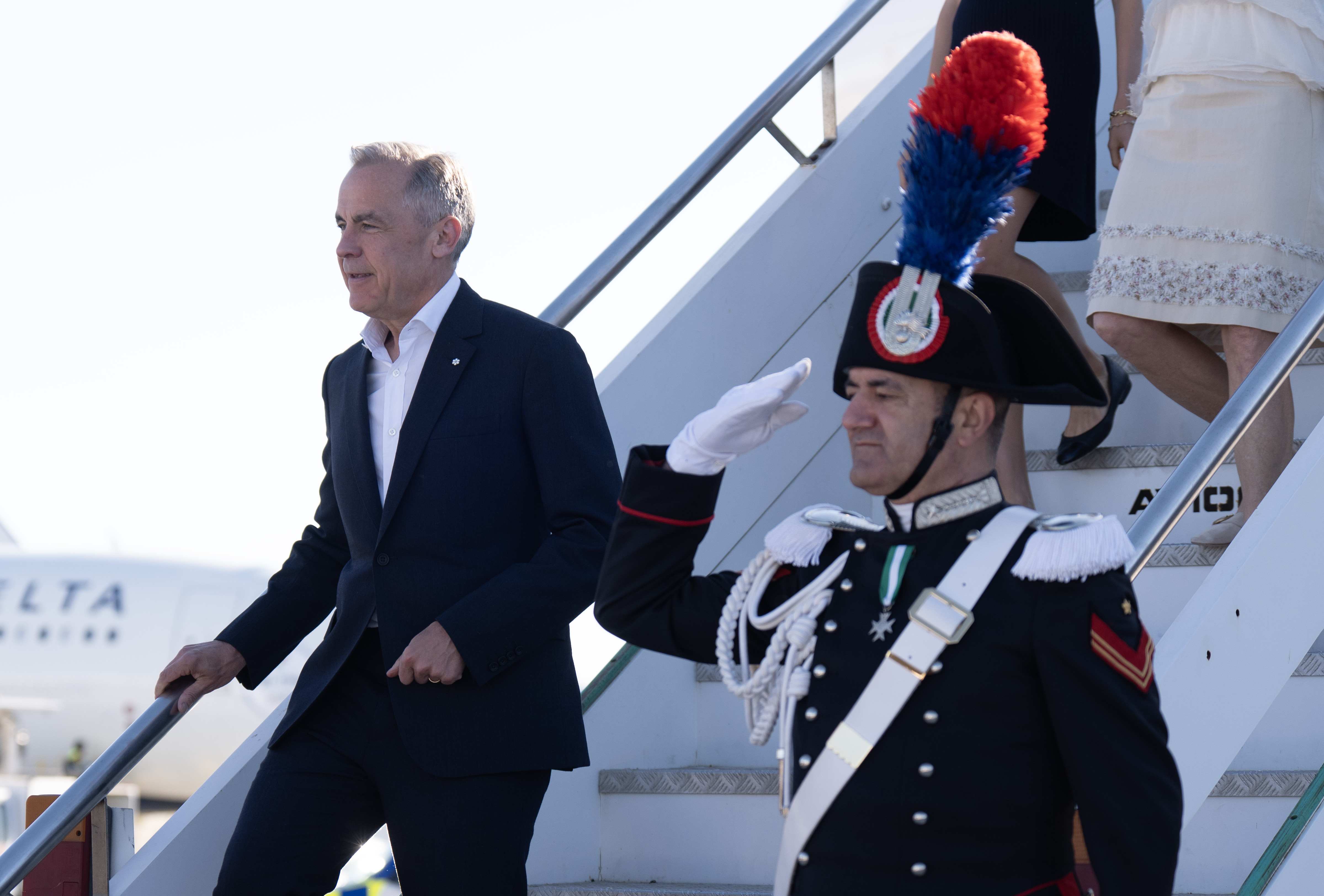 Carney lands in Rome to attend Pope’s inaugural mass