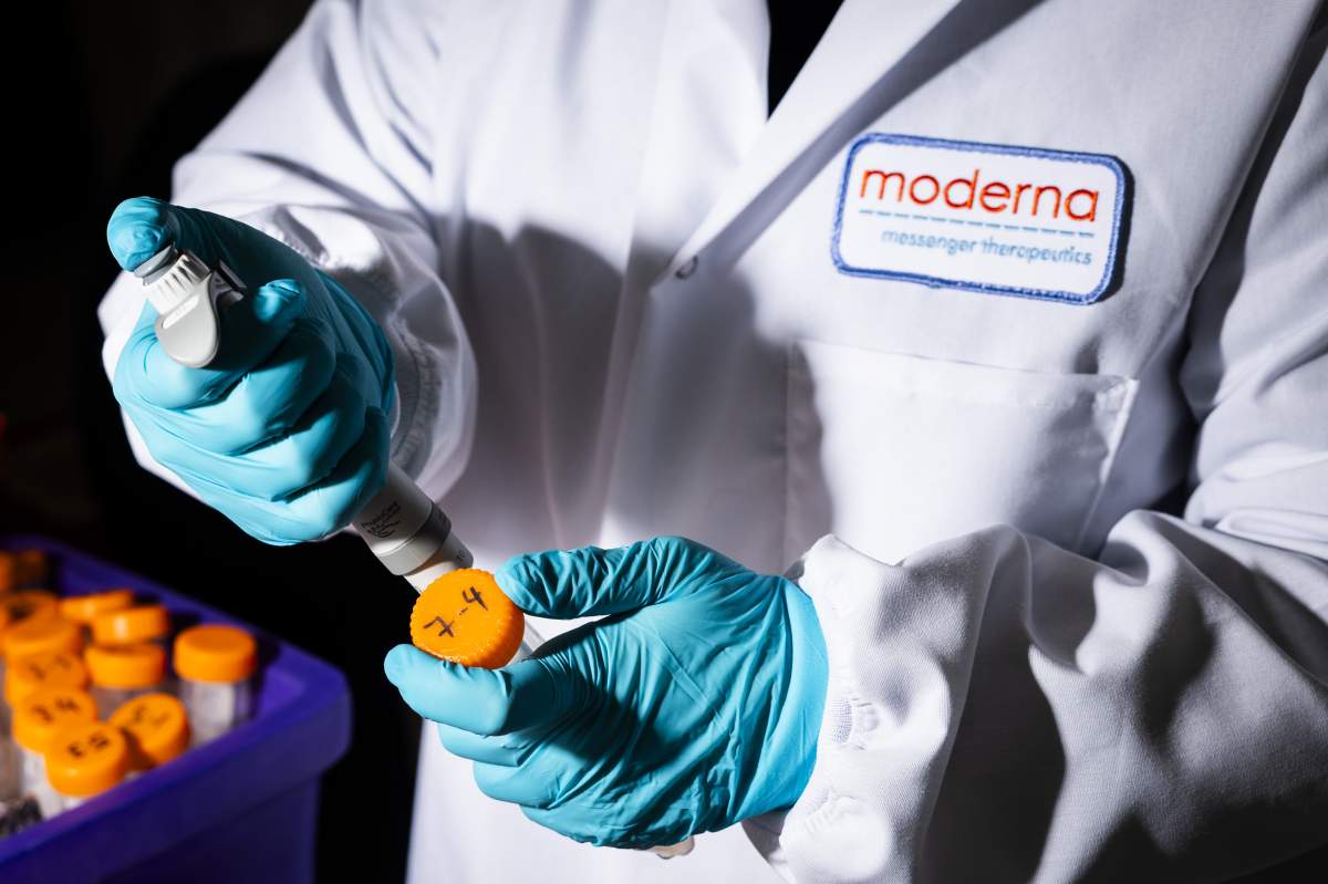 A researcher works in the lab at the Moderna Inc. headquarters in Cambridge, Massachusetts, US, on Tuesday, March 26, 2024. The forthcoming RSV shot, expected to get US regulatory approval this month, is Moderna's first chance to show the versatility of mRNA technology to more effectively treat and prevent a range of illnesses from the flu to cancer. It will be the first mRNA product for something other than Covid. Photographer: Adam Glanzman/Bloomberg via Getty Images