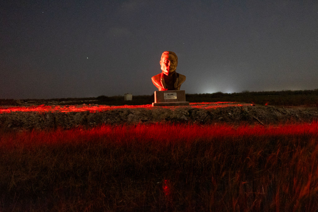 A statue of Elon Musk sits by the side of the road leading to his Space X facility, February 6, 2025 on the outskirts of Brownsville, Texas.