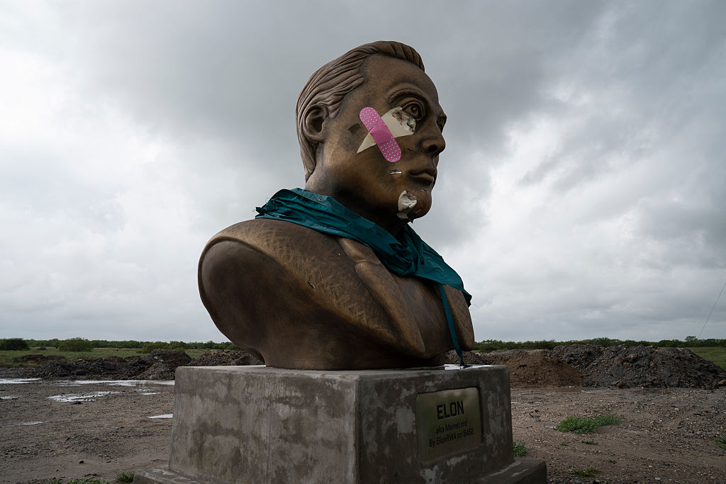 A bust of Elon Musk that was recently vandalized is seen near the SpaceX projects in Brownsville, Texas, on May 3, 2025.