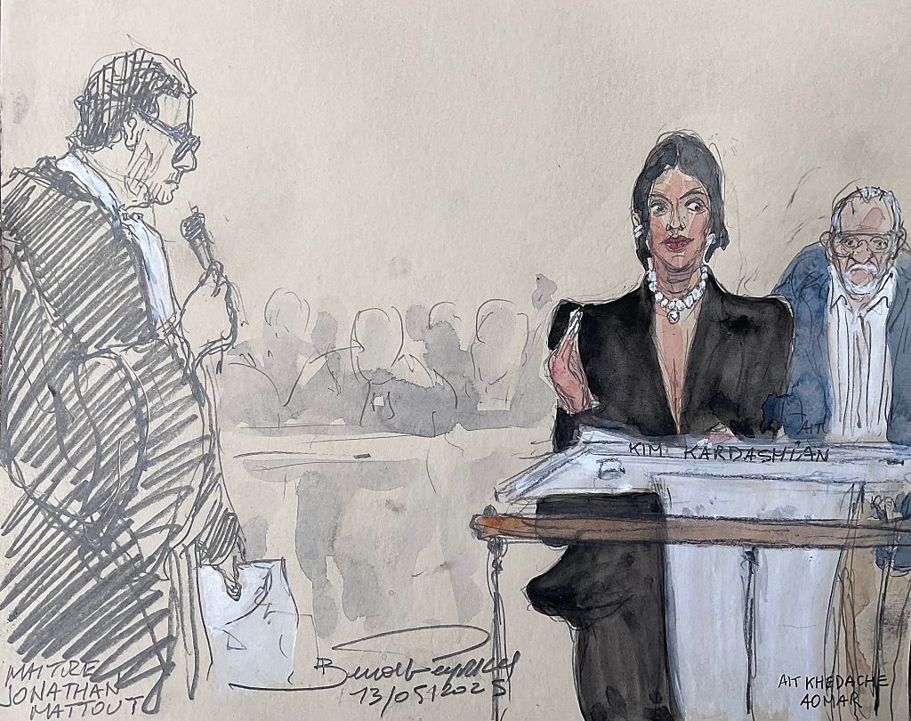 This court sketch made on May 13, 2025 in Paris shows US celebrity Kim Kardashian (R2), next to co-accused Aomar Ait Khedache (R), testifying before the Assize Court for the trial over the 2016 robbery that saw her relieved of millions of dollars' worth of jewelry at gunpoint.