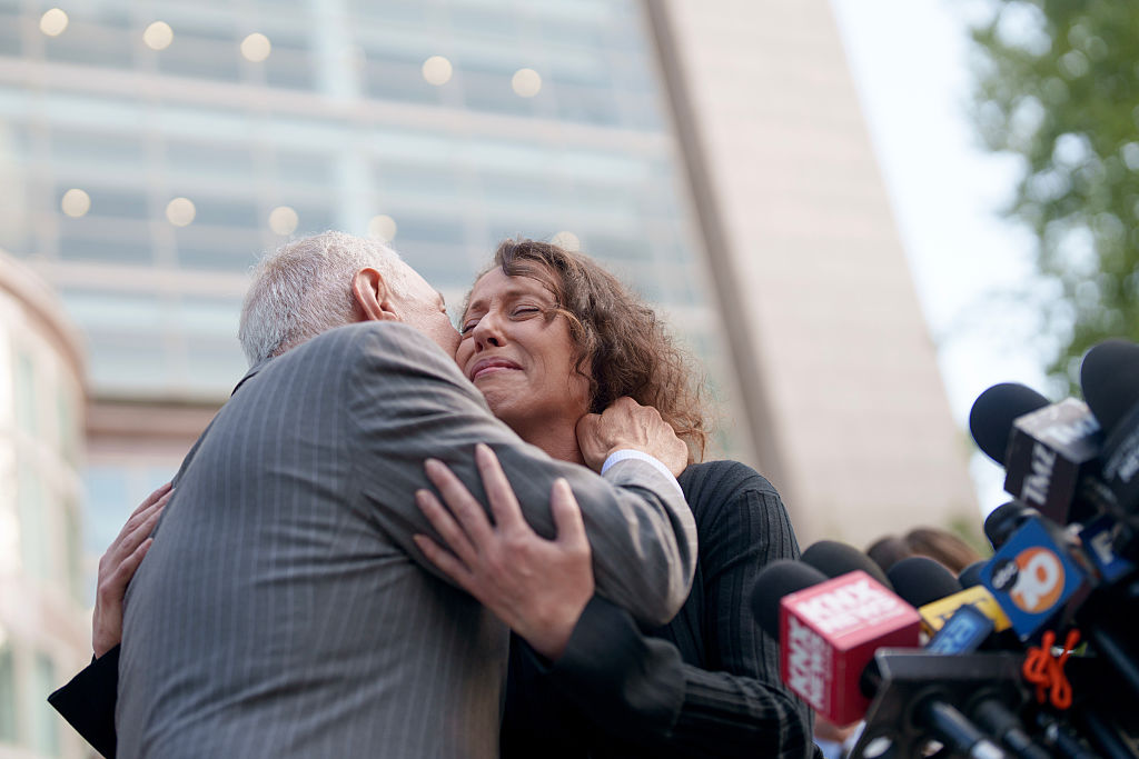 The brothers' lawyer, Mark Geragos hugs Anamaria Baralt, a cousin of Erik and Lyle Menendez, at the Van Nuys West Courthouse on May 13, 2025 in Van Nuys, California.
