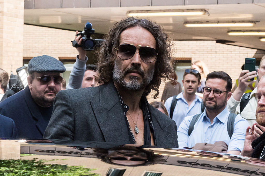 British comedian Russell Brand leaves Southwark Crown Court followed a plea and trial preparation hearing after being charged with rape, oral rape, indecent assault and two counts of sexual assault, between 1999 and 2005 in Bournemouth and the Westminster area in London, United Kingdom on May 30, 2025.