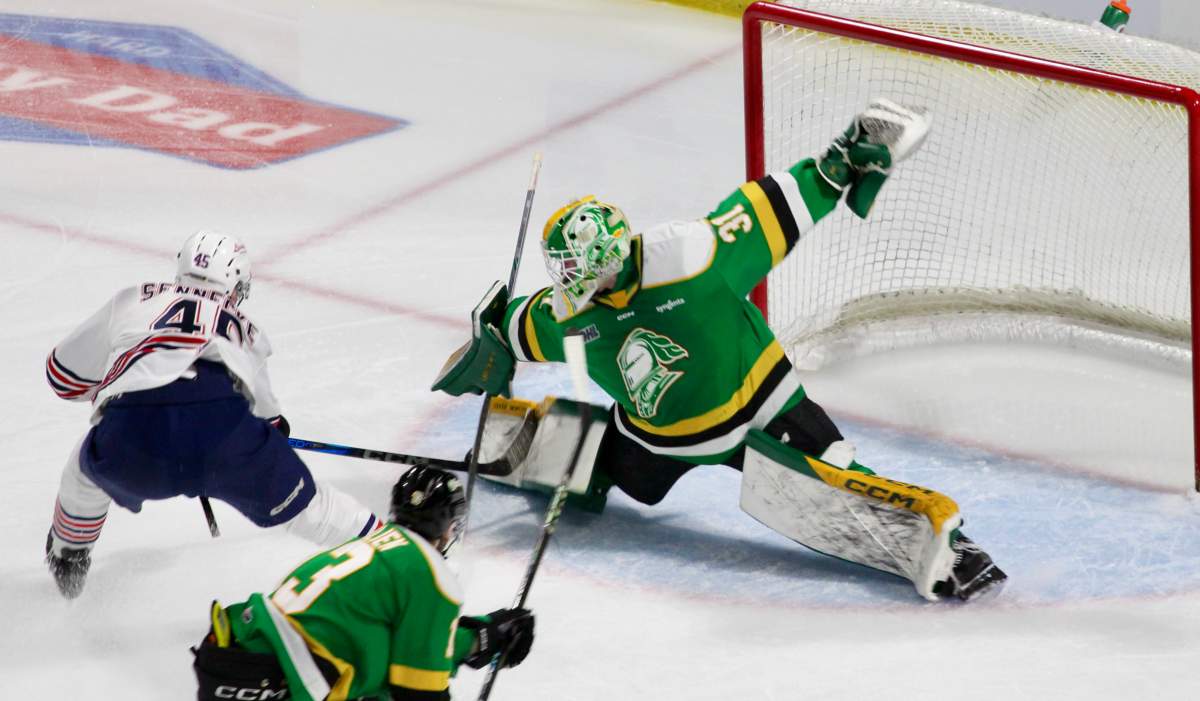 Austin Elliott of the London Knights stretches out toshield his net from Beckett Sennecke of the Oshawa Generals in Game 1 of the OHL Championship Series on May 8, 2025 at Canada Life Place.