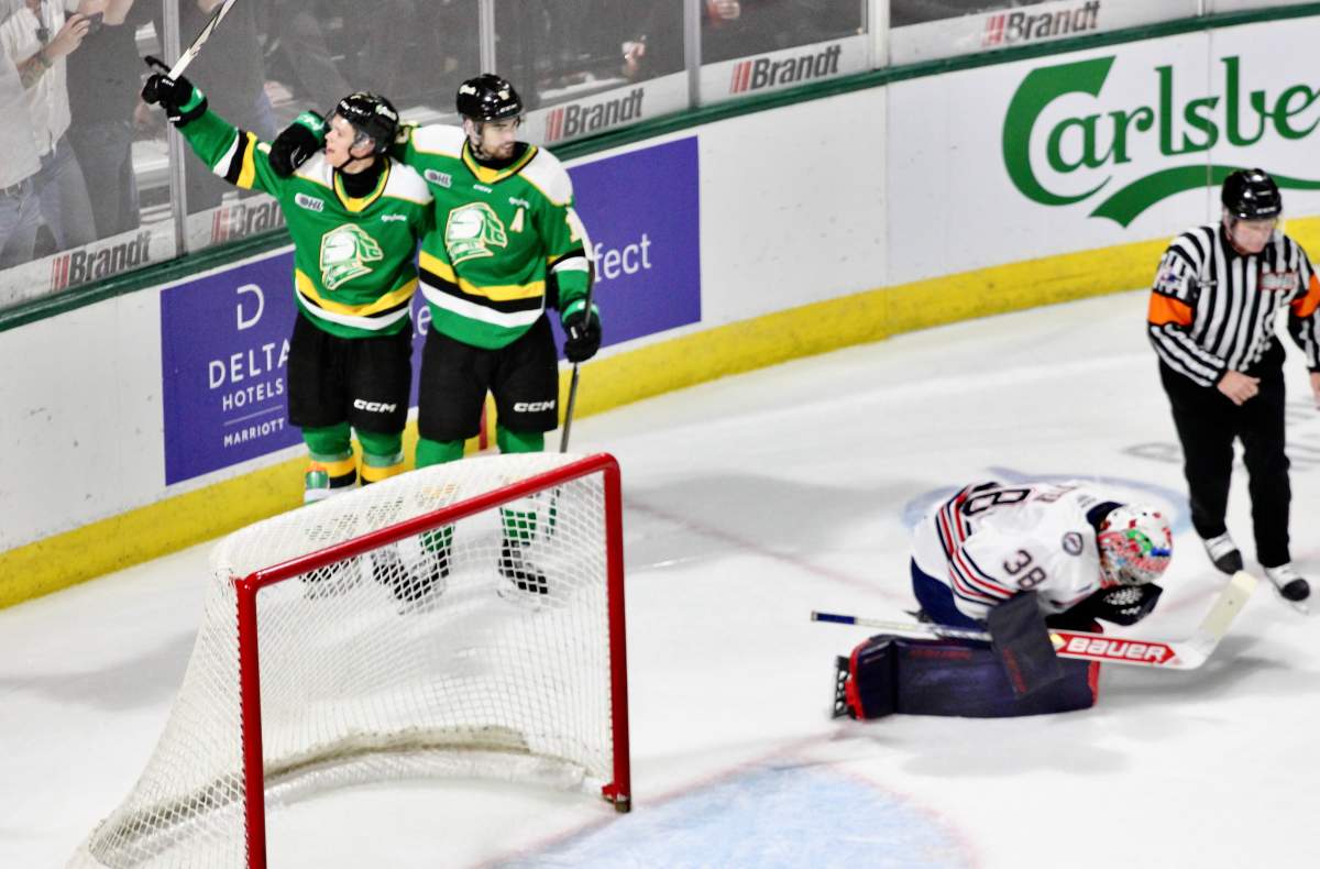 Jacob Julien and Easton Cowan celebrate the London Knights fourth goal in a 5-2 London win in Game 2 of the OHL Championship played on May 11, 2025 at Canada Life Place.