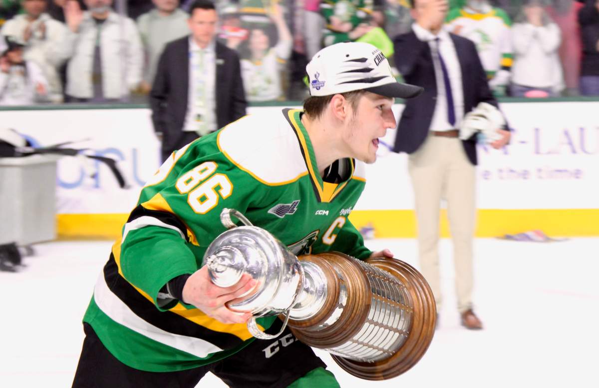 Denver Barkey holds the J. Ross Robertson Cup.